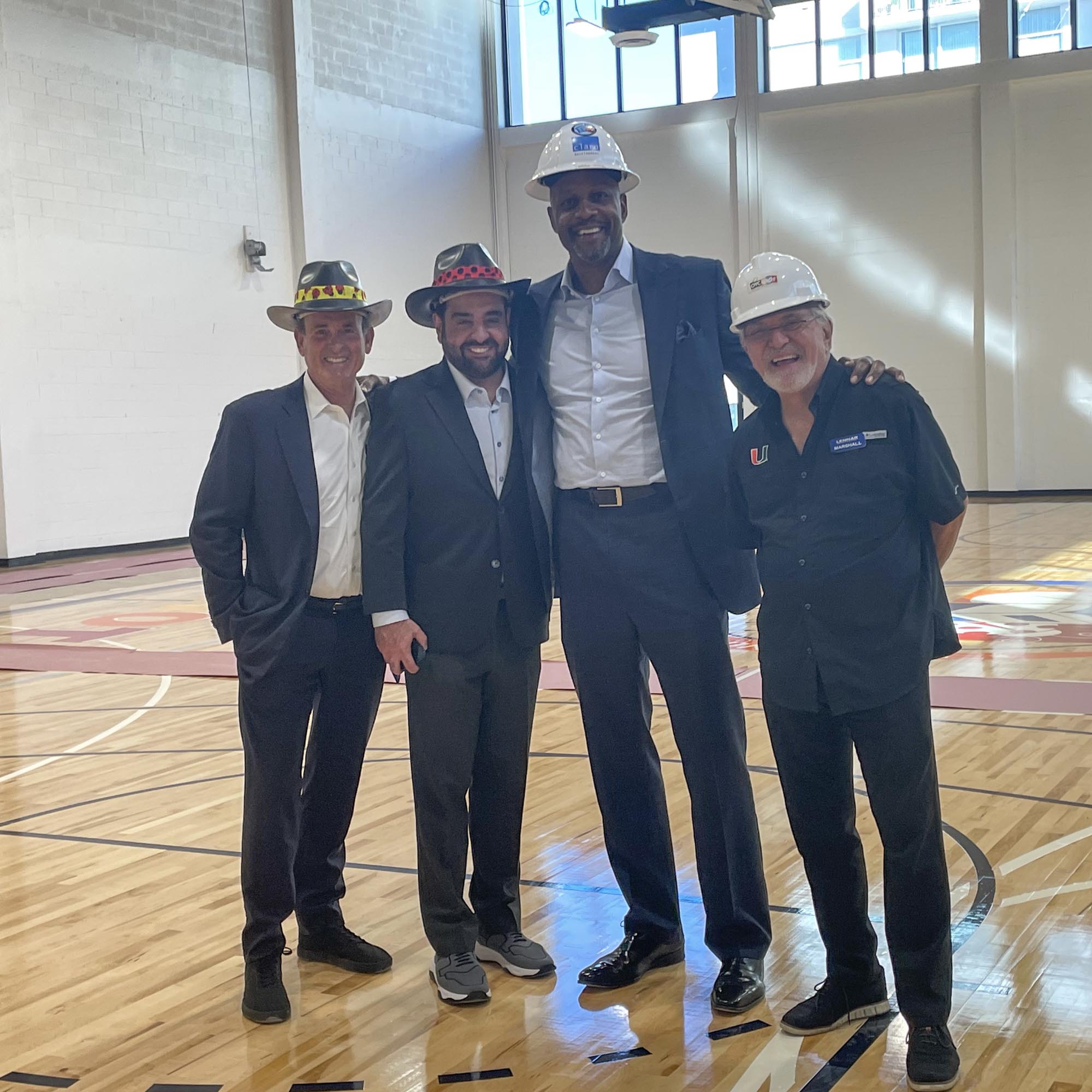 Alonzo Mourning leads a hard hat tour of the new OYC facility in Overtown.