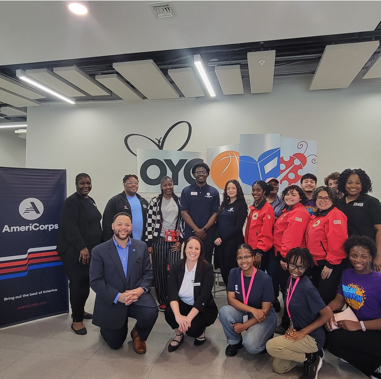 AmeriCorps members along with OYC Miami staff pose for photo during a recent visit to the OYC facility.