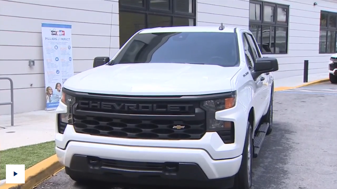 photo of a white chevy silverado donated to OYC by Rick Case Group