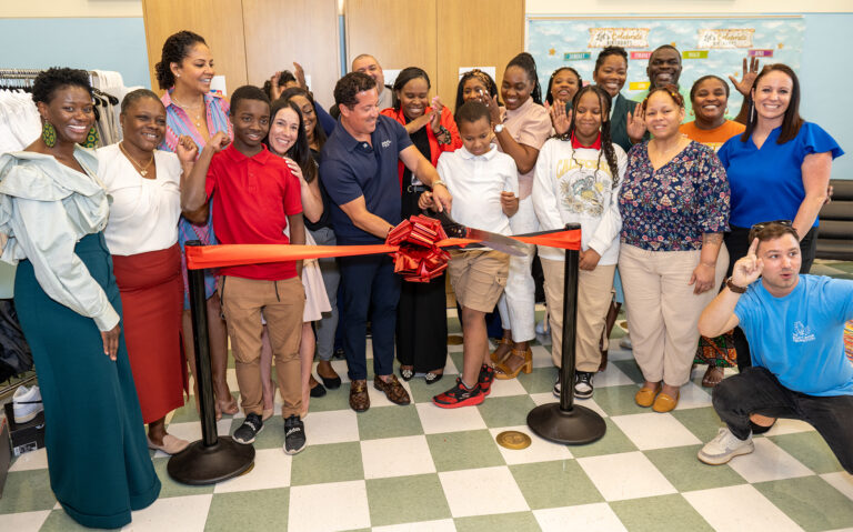 OYC Staff at a ribbon cutting ceremony