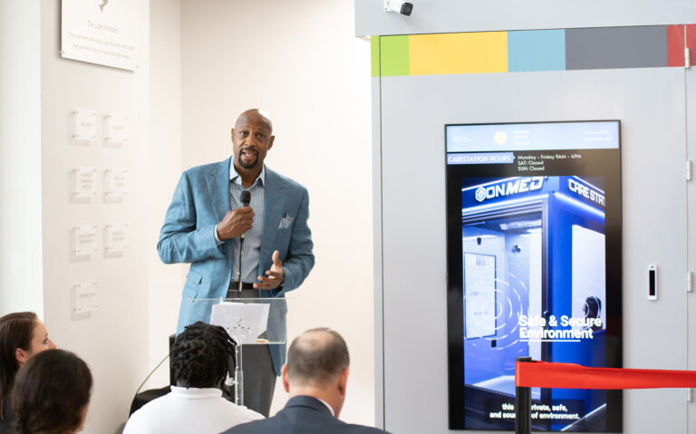 Alonzo Mourning speaks at the OnMed ribbon cutting ceremony at OYC Miami