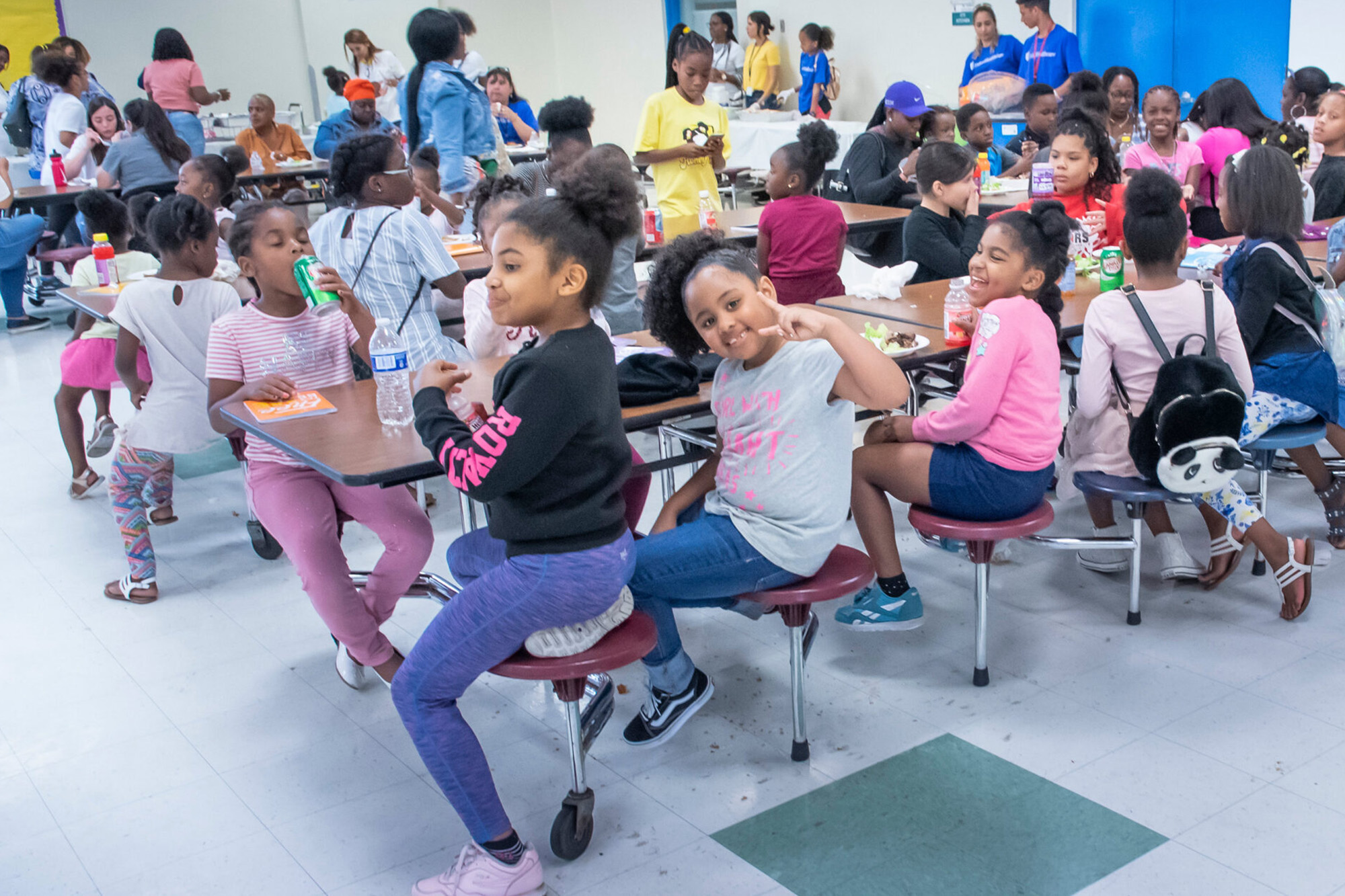 children seated at a lunch table