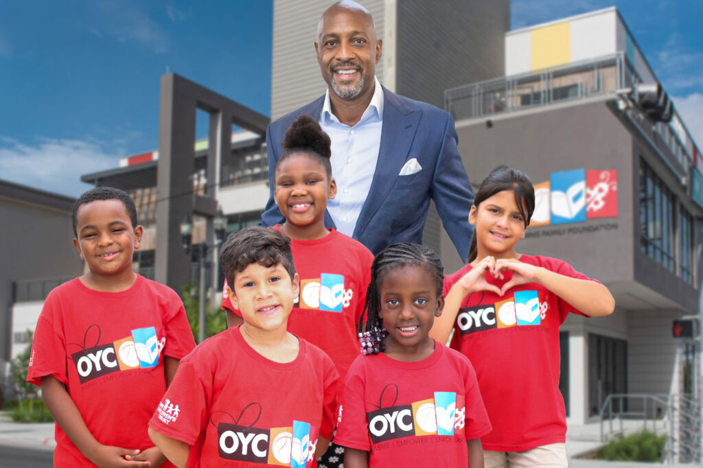 Alonzo Mourning and 5 children wearing OYC Miami shirts