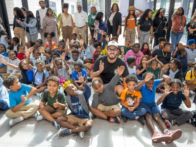 group-photo-with-children_join-our-team_2000x1500